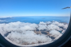 Nunavut, Kugluktuk Coppermine) - Ocean Endeavour white dot above the clouds