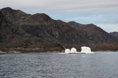Greenland, Sisimiut - Kayaker went around Iceberg