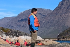 Greenland, Disko Bay - Jason Edmunds, Expedition Leader - Kayakers In Red Suits