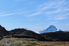 Greenland, IIalissat - Sermeq Kujalleq Glacier, people on ridge & Icefields
