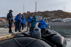 Nunavut, Pond Inlet - Steven loading Zodiacs, chasing local dog  out of one